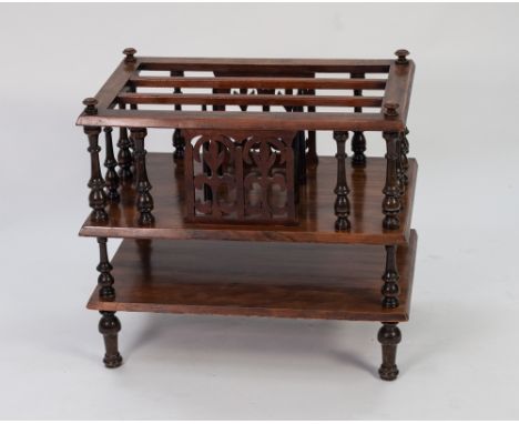 LATE VICTORIAN CARVED WALNUT MUSIC CANTERBURY, the galleried top with three long division, pierced central side panels and tu