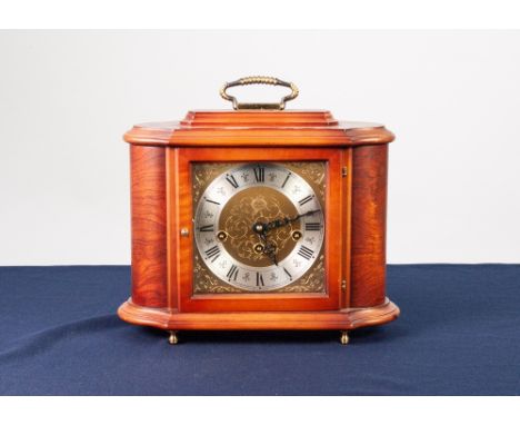 RAPPORT, LONDON, MODERN WALNUT CASED MANTEL CLOCK, with silvered Roman chapter ring and movement striking on a rack of five r