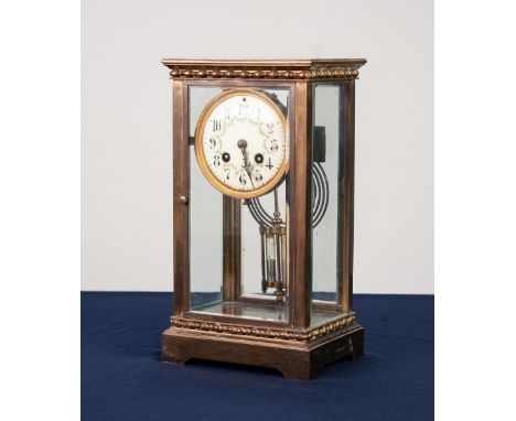 CIRCA 1900 BRASS CASED FOUR GLASS MANTEL CLOCK, the movement striking on a gong with mercury filled compensating pendulum and