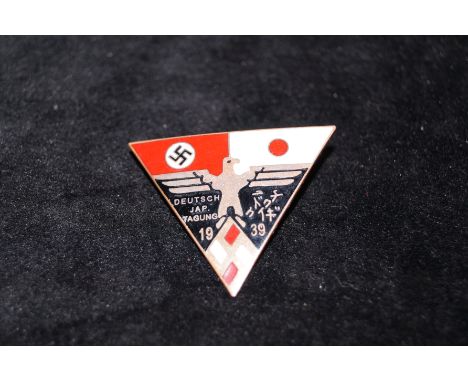 Enamel pin badge depicting imperial eagle  and swastika 