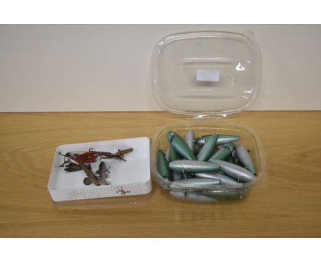 A selection of vintage fishing minnows and some hand painted wooden lure bodies