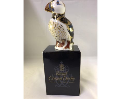 Royal Crown Derby - An Imari Puffin bird paperweight, hexagonal gold 21 button, 12cm max, original box (2) 