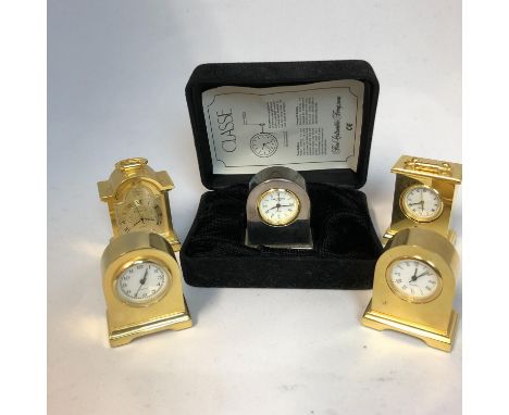Five modern Classe miniature clocks, three arched mantel clocks; a carriage clock; and a bracket clock, quartz movements, bra