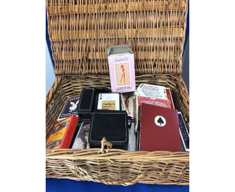 A small Fortnums and Mason wicker hamper, containing various packs of playing cards;m, an Art Deco chromium playing card box;
