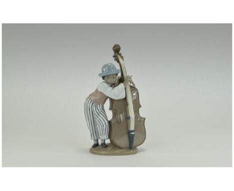 Lladro Figure ''Jazz Bass''  Model number 5834, issued 1991. 10'' inches high. Mint condition, boxed 