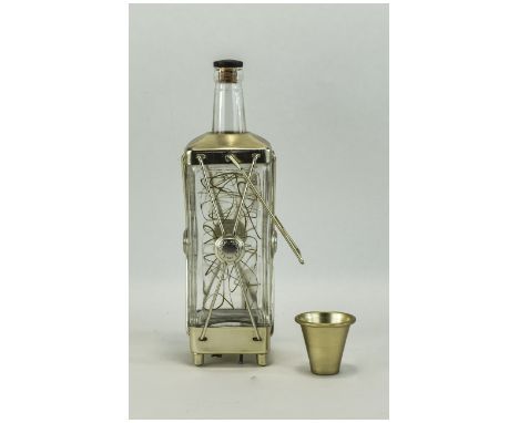 A Vintage Japanese Novelty Musical Glass and Metal Decanter Cup. c.1950's. Plays a Tune When You Lift up The Decanter and Sto