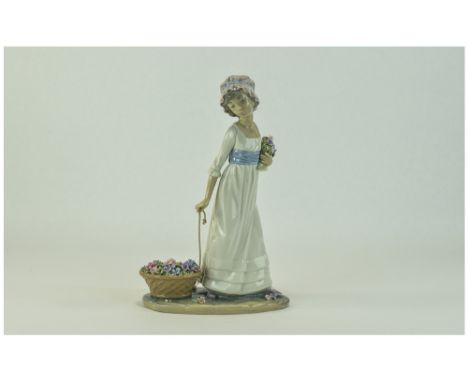 Lladro Figure with Flowers ' Wild Flower ' Model Num 5030. Issued 1979 - 1994. Artist Vincente Martinez. Height 11 Inches. Mi