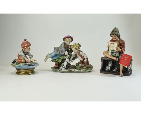 Capodimonte Signed Figures ( 3 ) In Total. 1/ Newspaper Boy. 2/ Boy Playing with Boat. 3/ Boys Playing with a Dog. 