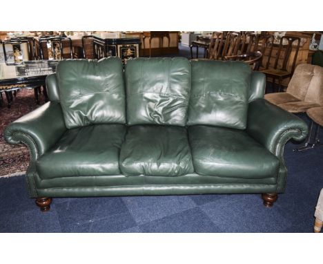 An Expensive and Good Quality Green Leather 3 Seater Sofa With 3 Removable Soft Leather Cushions. Depth of seat cushions 32 i