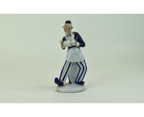 Sitzendorf Hand Painted Porcelain Figure of a Sad Clown, Dressed In a Blue and White Costume Playing a Concertino. c.1930's. 