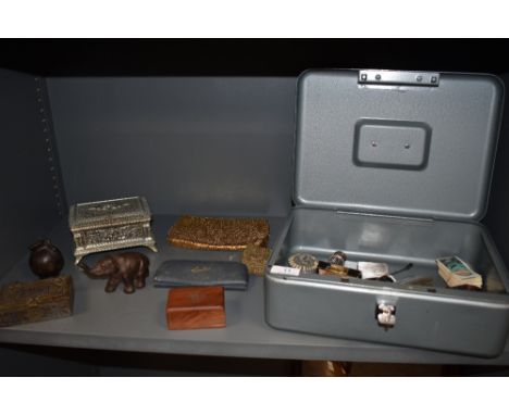 A miscellany of items including a Vanguard lockable metal box containing sugar nips, photo frame, compact, and brass jeweller