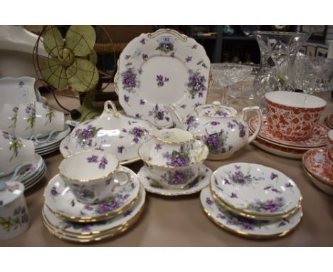 A mid century collection of Hammersley 'Victorian Violets', having vibrant violet transfer pattern with gilt edging and accen