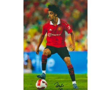 Zidane Iqbal signed 12x8 inch colour photo pictured in action for Manchester United. Good condition. All autographs come with