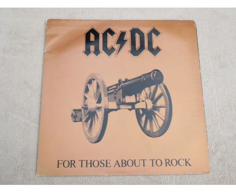 AC/DC For those about to Rock We Salute You Near Mint Vinyl LP K 50851Features Embossed Gatefold album cover.The vinyl is in 