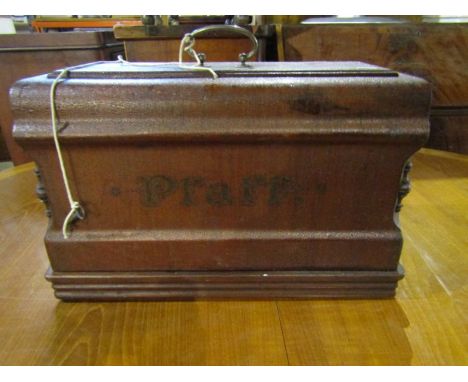 Vintage Pfaf sewing machine in wooden case with key