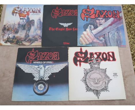 Saxon Lot of 5 Heavy Metal UK Vinyl AlbumsWheels of Steel - the vinyl is in near mint conditionSelf Titled - the vinyl is in 