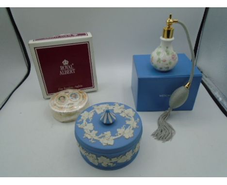 Wedgwood Jasperware lidded trinket box decorated with vine leaves, diam 12cm, together with a boxed Wedgwood rosehip perfume 