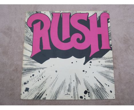 Rush Self Titled Original UK 1974 Vinyl LP Near MintLabel: Mercury – 9100 011The vinyl is in near mint condition, the sleeve 