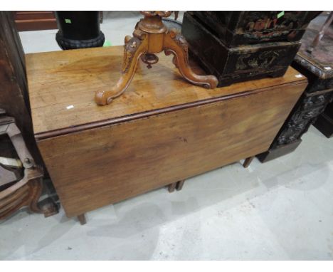 An early 19th Century Georgian design mahogany drop leaf dining table on square tapered gate legsimage shows one leaf up, gen