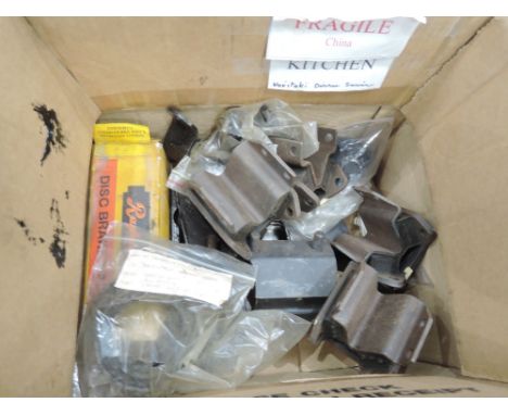 A box of Jaguar engine and gear box mountings