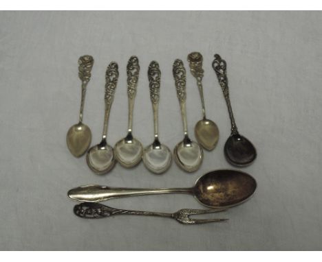 A selection of Norwegian silver teaspoons by Brodrene Mylius &amp; Brodrene Lohne, a German spoon and white metal pickle fork