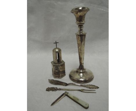 A selection of white metal and HM silver including candle stick, small pen knife and a Middle Eastern model of a religious to