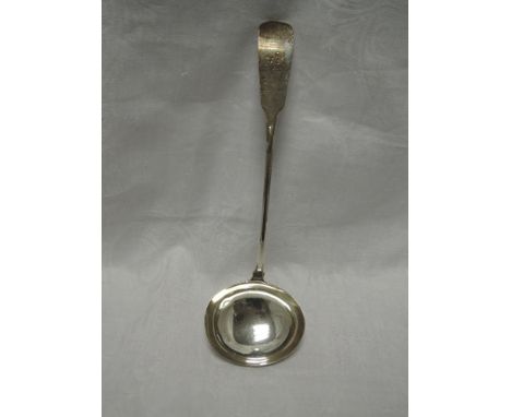 A Georgian Irish silver ladle bearing crest to terminal, Dublin 1810, Samuel Neville