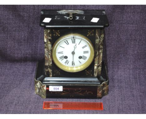 A Victorian black and marble mantel clock having Roman numeral dial and striking mount