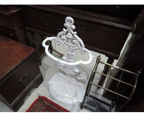 A traditional design cast stick stand white painted, in the Coalbrookdale style