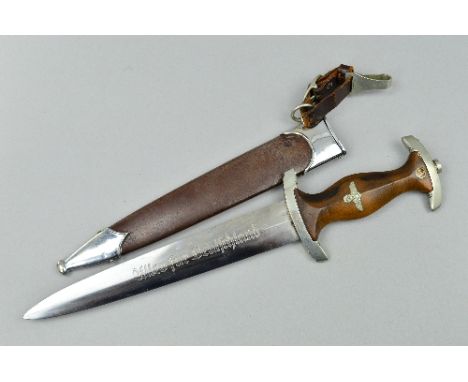 A GERMAN WWII ERA 3RD REICH S.A. DAGGER AND SCABBARD, in good all round condition, the blade is marked 'Ulles Fur Deutfchland