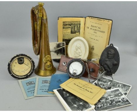 A BOX CONTAINING A BRASS MILITARY BUGLE, with the badge of the 23 Royal Welsh Fusiliers, two small wall plaques, I of Napoleo