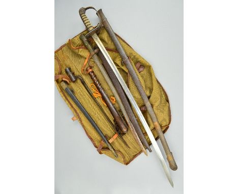 A CANVAS BAG CONTAINING A VICTORIAN ERA SOCKET BAYONET, with proof mark 'E30' in leather and metal scabbard, a Chassepot styl