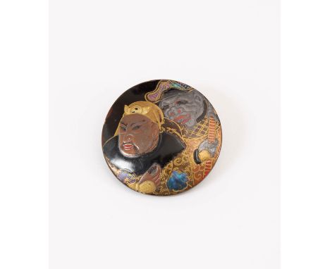 AN UNUSUAL JAPANESE LACQUER MANJU NETSUKE MEIJI ERA, 19TH CENTURY Decorated to the front with two figures, possibly the Chine
