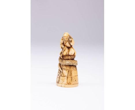 A JAPANESE TOOTH NETSUKE OF KIYOHIME ON THE DOJOJI BELL MEIJI ERA, 19TH CENTURY The witch is depicted with long hair and flow