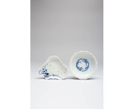 TWO JAPANESE BLUE AND WHITE MOULDED DISHES EDO PERIOD, 17TH AND 18TH/19TH CENTURY The first of trilobe shape and raised on a 