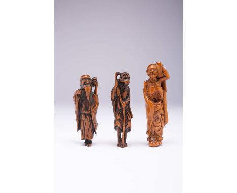 TWO JAPANESE WOOD NETSUKE OF SENNIN EDO PERIOD, 18TH OR 19TH CENTURY The two sages depicted wearing coats of mugwort leaves, 