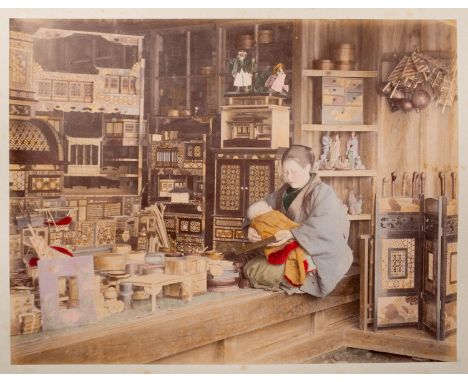 TAMAMURA KOSABURO (1856-1923) MEIJI ERA, 19TH CENTURY An album of Yokohama shashin (early Japanese photographs), albumen silv