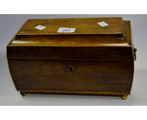 A walnut sarcophagus shaped tea caddy 