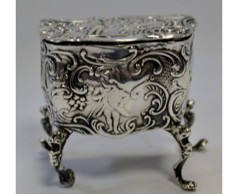 A late 19th Century silver Dutch miniature bombe commode chest