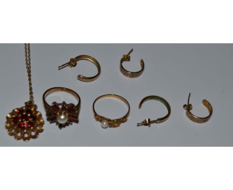 A 9ct gold and garnet ring;  a similar pendant;  9ct gold earrings;  etc 