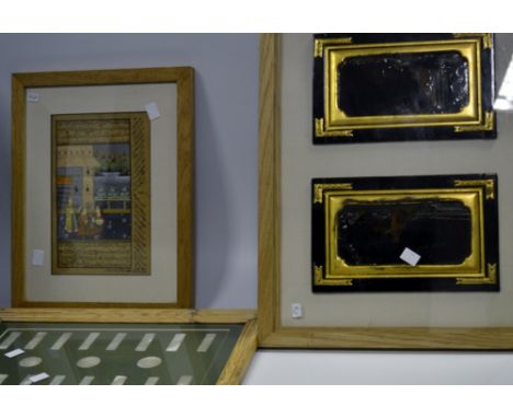 Asian Art - a framed set of gaming tokens; a pair of Oriental lacquer panels, framed; a framed print of a Middle Eastern manu