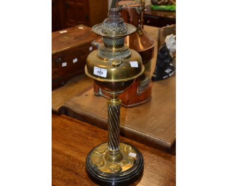 A brass lamp, fluted column, painted base
