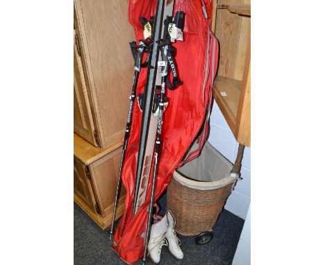 A pair of lady's ice skates c 1960's; a pair of Scott walking poles; a set of skis
