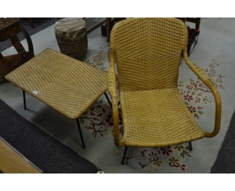 A 1950's cane chair and coffee table