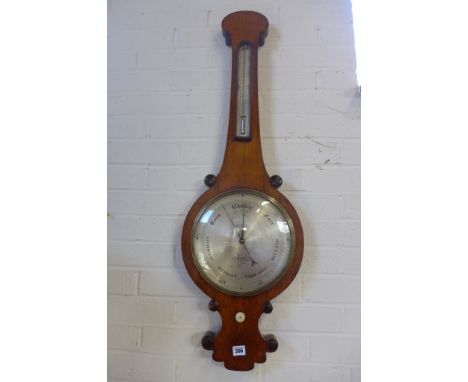 A 19th century oak barometer by West of London, silvered dial with thermometer above 102cm tall 