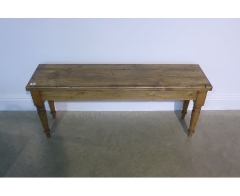 A rustic bench, 117cm wide 