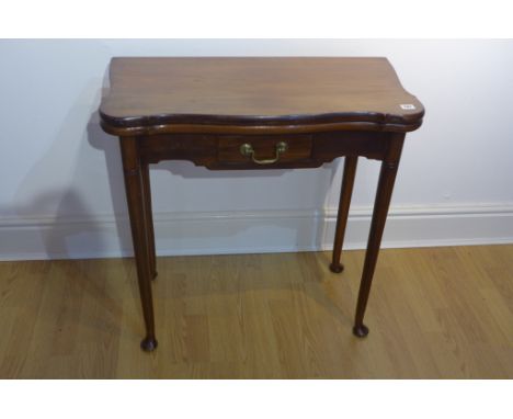 A 19th century fold over top card table with a drawer and turned legs on pad feet - 74cm tall x 75cm wide 