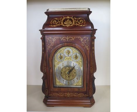 An impressive inlaid mahogany triple fusee bracket clock by J Hughes London, with Westminster chime and chime on eight bells 
