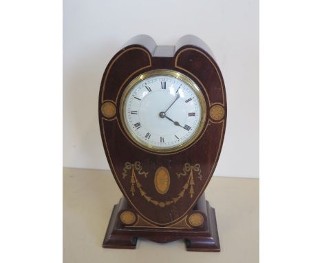 An Art Nouveau French mahogany inlaid mantle clock, 26cm tall, running order 