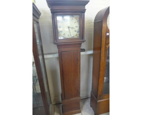 An oak 30 hour longcase clock with an 11 inch square painted dial, 74 inches tall 